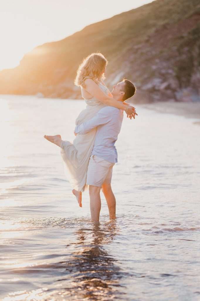 Cornwall Wedding Photography. A beautiful Engagement Shoot at sunset at Whitsand Bay, Cornwall