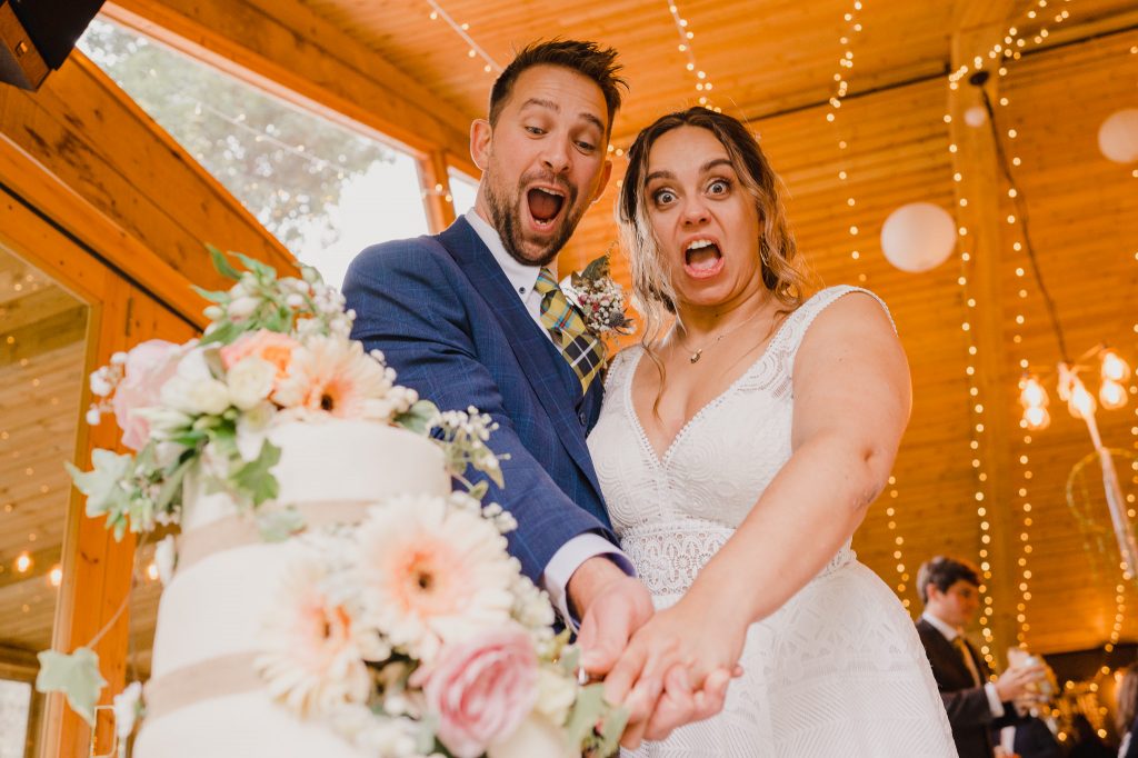 Wedding Couple Cutting Cake |Chycara | Truro | Cornwall | Wedding Venue | Cornwall Wedding Photography