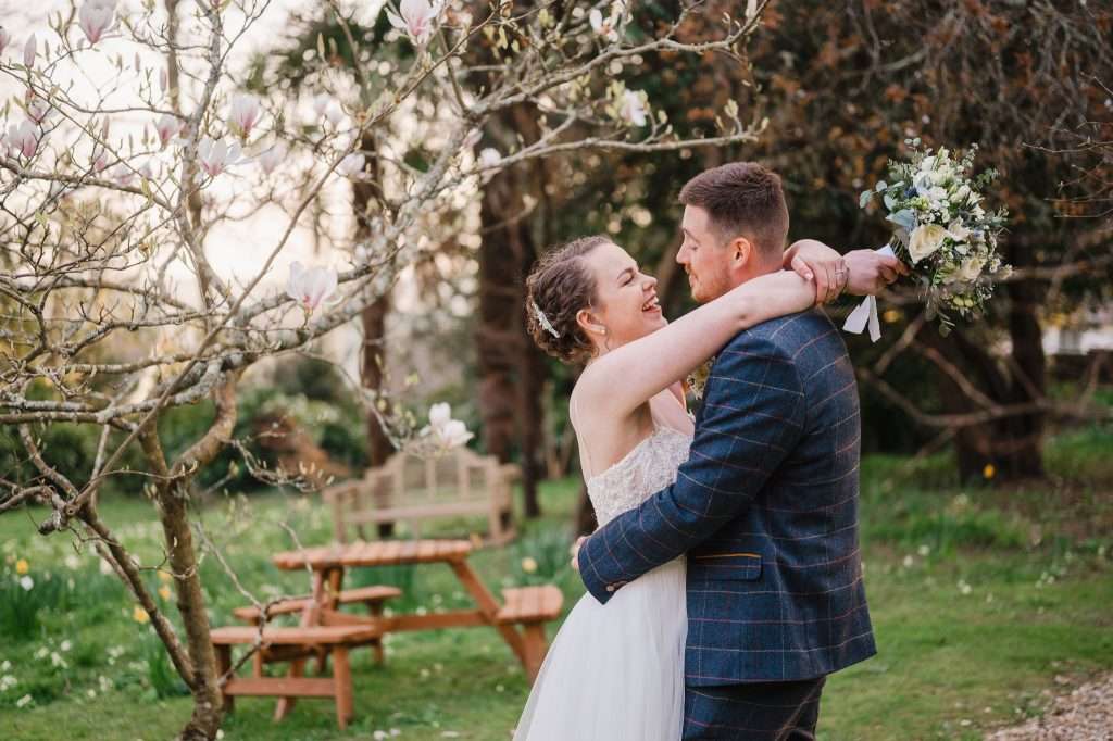 My Guide to Wedding Planning | Cornwall Wedding Photographer | Couple laughing at The Alverton