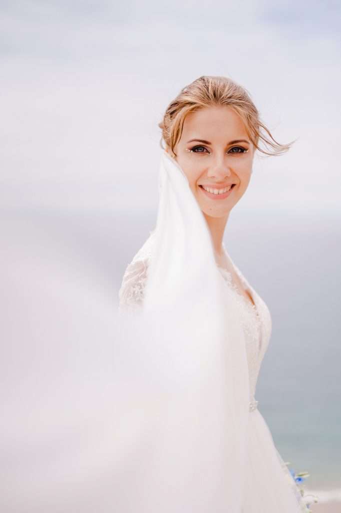 The Top Wow Factor Wedding Venues in Cornwall and Devon | Lusty Glaze | Cornwall Wedding Photographer | Cornwall Wedding Venues | Bride Posing With Veil