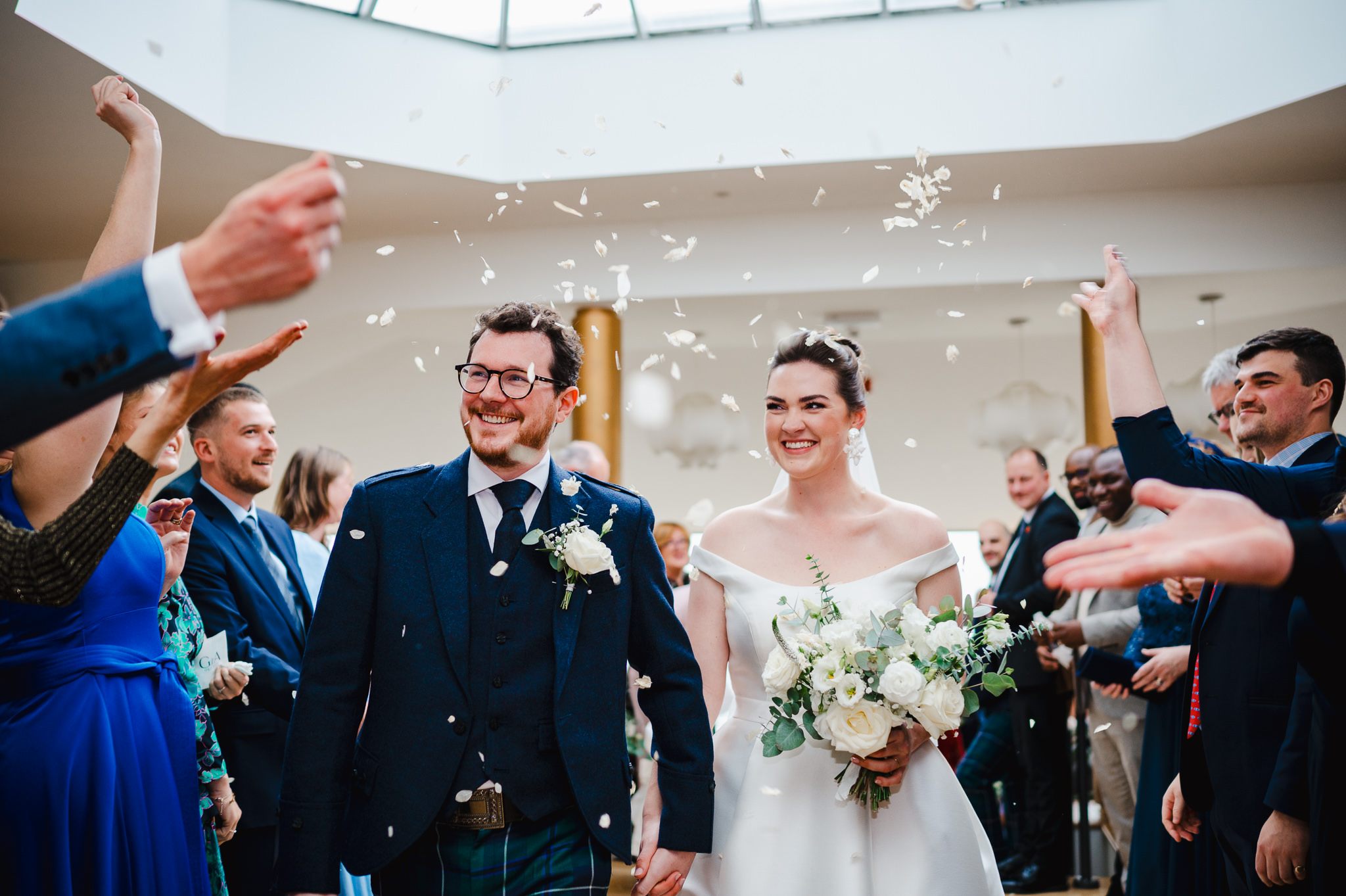 Wedding Confetti being thrown as they walk back down the aisle at Polurrin