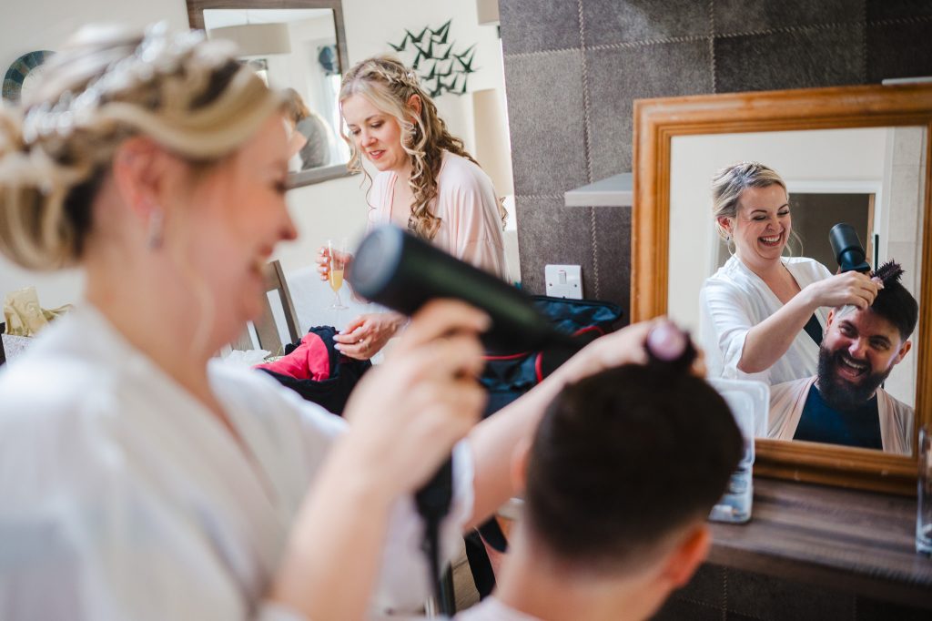 Bride hair styling her bridal party