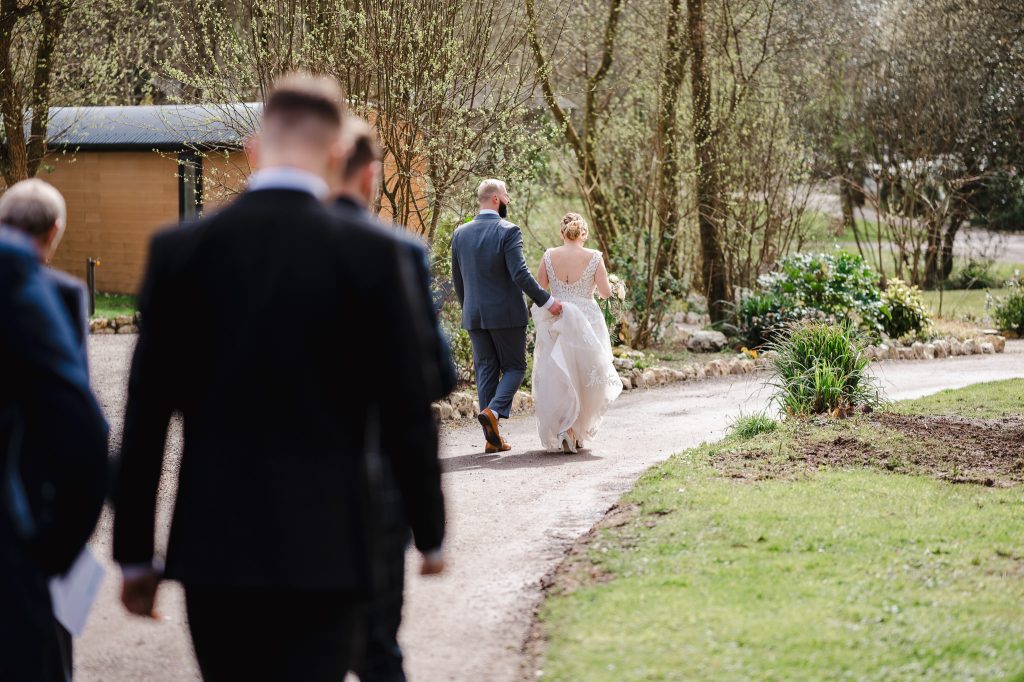 Walking towards wedding reception