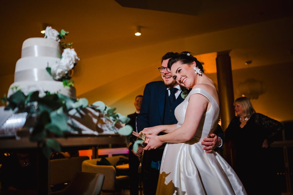 Wedding Cake cutting with a sword