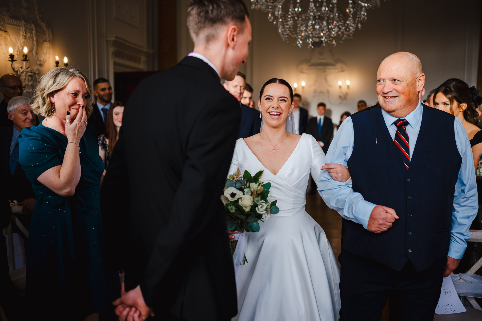 Walking down the aisle at Rockbeare Manor Wedding Venue