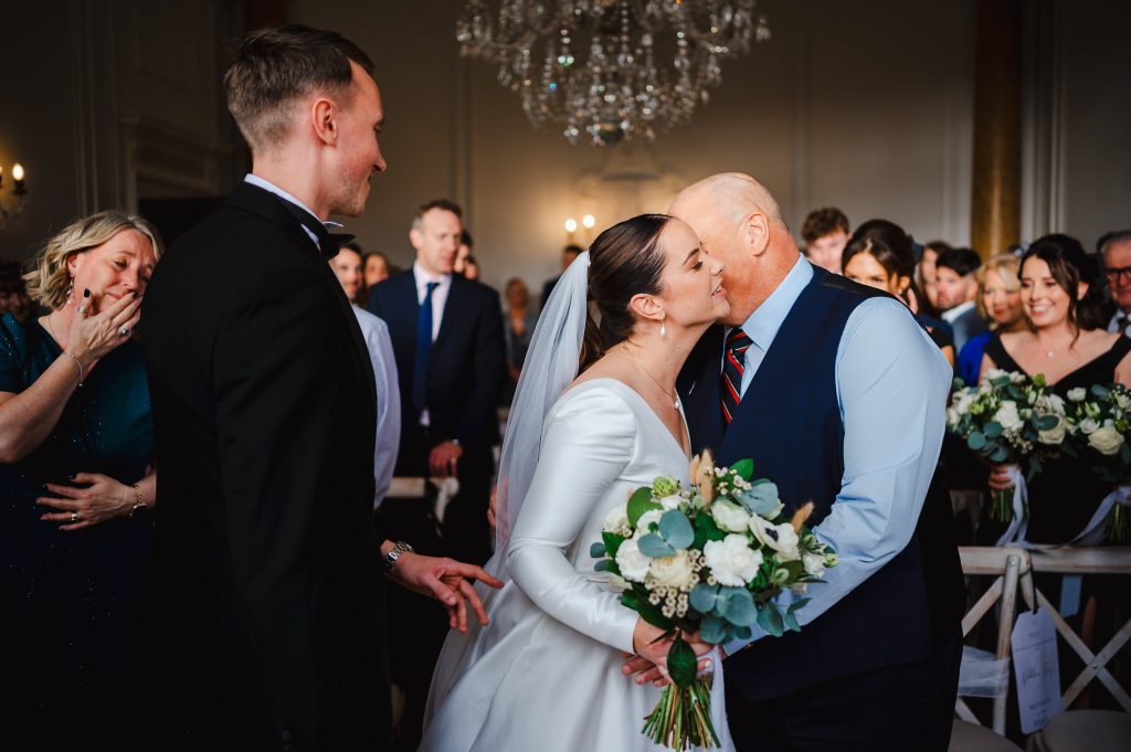 Walking down the aisle at Rockbeare Manor Wedding Venue